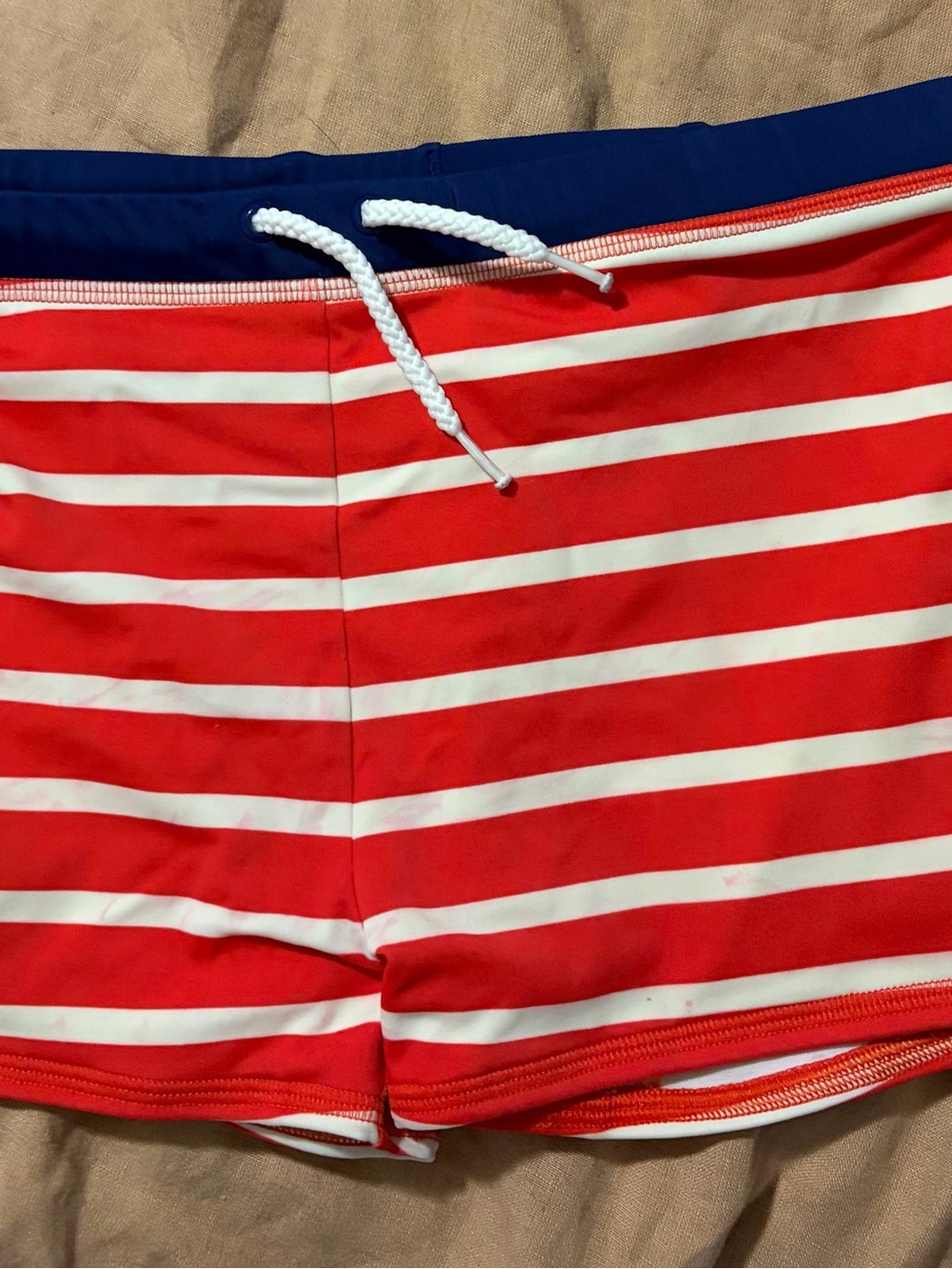 Mini Boden Red and White Striped Boys Swim Trunks with Navy Waistband
